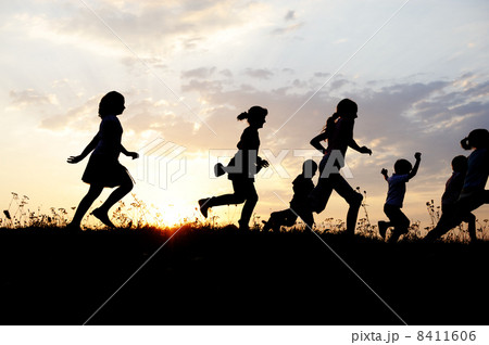 Silhouette, group of happy children playing on meadow, sunset, summertime Silhouette, group of happy children playing on meadow, sunset, summertime 8411606
