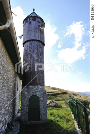 Old small mosque in mountains 8411660