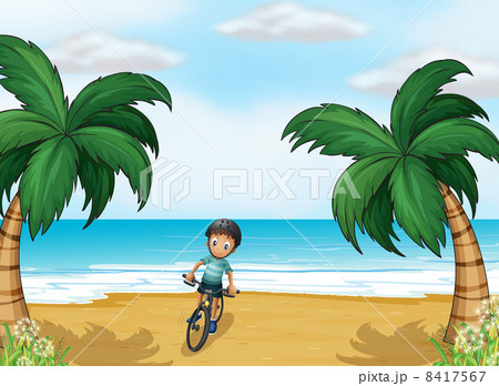 A boy biking at the beach A boy biking at the beach 8417567
