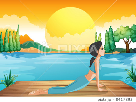 A girl performing yoga along the river 8417892