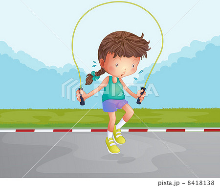 A little girl playing jumping rope at the road 8418138