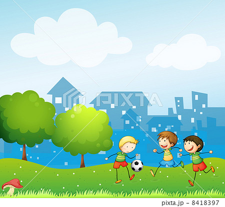 Three kids playing soccer in the hill 8418397