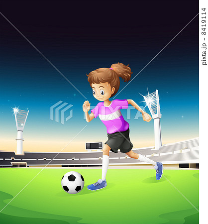 A girl playing football at the field A girl playing football at the field 8419114