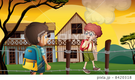 Two students talking near the barbwire fence Two students talking near the barbwire fence 8420318