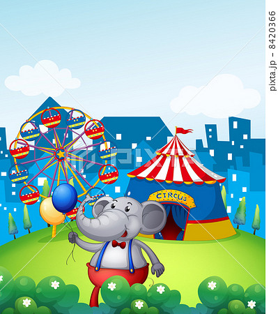 An elephant with balloons in front of a carnival 8420366