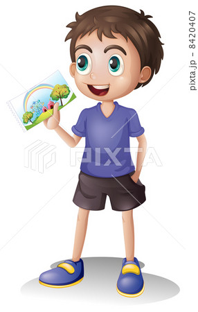 A boy holding a picture 8420407