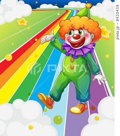 A clown standing in the colorful road A clown standing in the colorful road 8420439