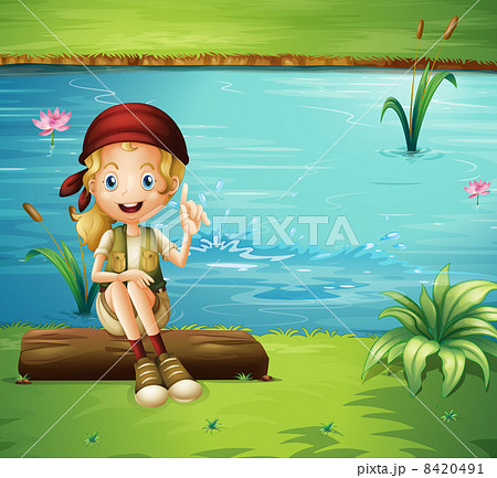 A girl sitting above a log at the riverbank A girl sitting above a log at the riverbank 8420491