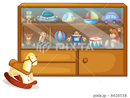A horse toy beside a wooden cabinet 8420538