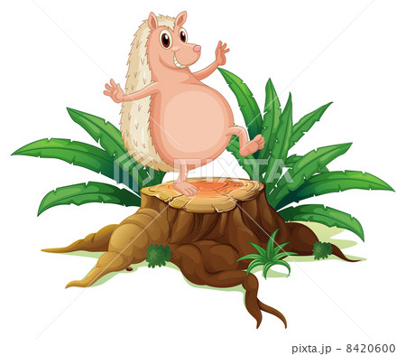 A molehog standing on the stump with leaves A molehog standing on the stump with leaves 8420600