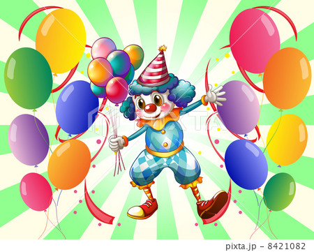 A clown between a group of balloons A clown between a group of balloons 8421082