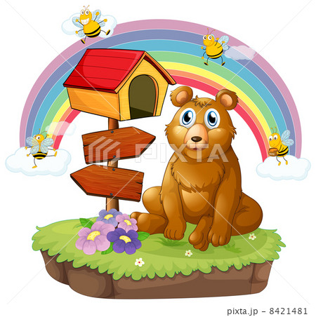 A bear beside a wooden mailbox and a wooden signboard 8421481
