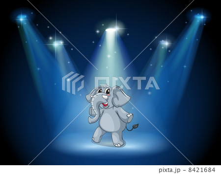 An elephant dancing in the middle of the stage 8421684