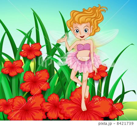 A fairy at the garden with red flowers 8421739