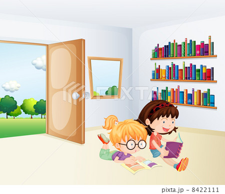 Two girls reading inside a room Two girls reading inside a room 8422111