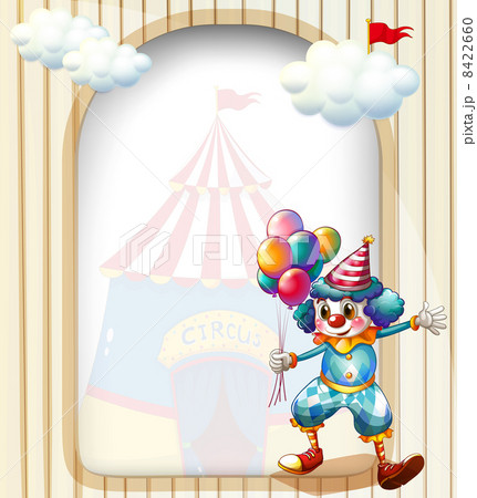 A clown with balloons at the entrance of the carnival A clown with balloons at the entrance of the carnival 8422660