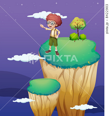 A boy pointing at the sky 8422903