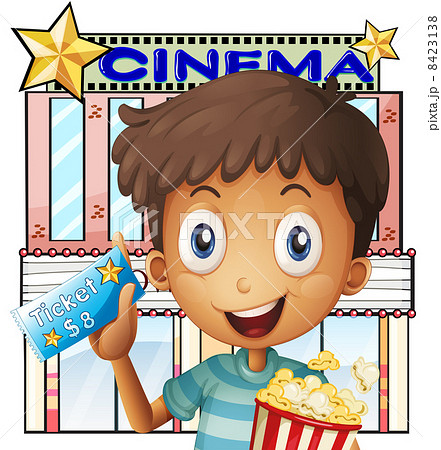 A boy holding a pail of popcorn and a ticket outside the cinema A boy holding a pail of popcorn and a ticket outside the cinema 8423138