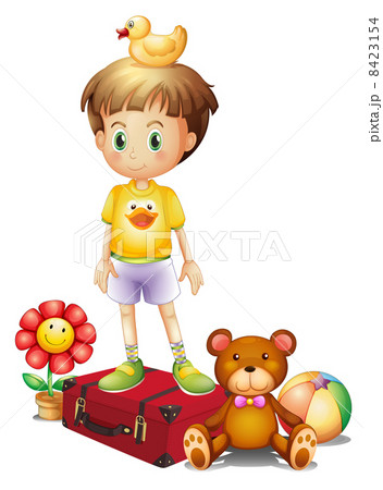 A boy above the red box with his different toys 8423154