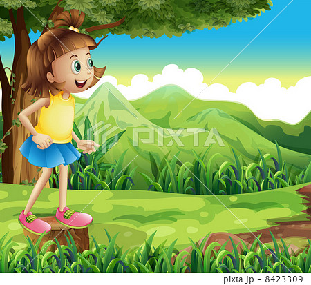 A happy girl standing above a stump at the hill 8423309