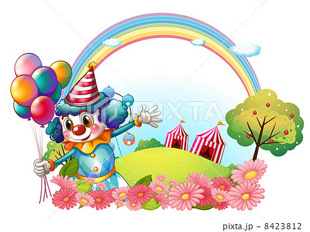 A female clown at the hill with a rainbow 8423812