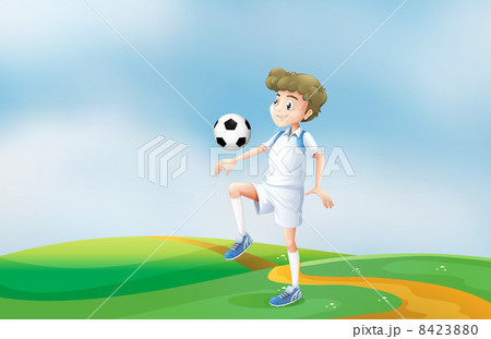 A soccer player practicing 8423880