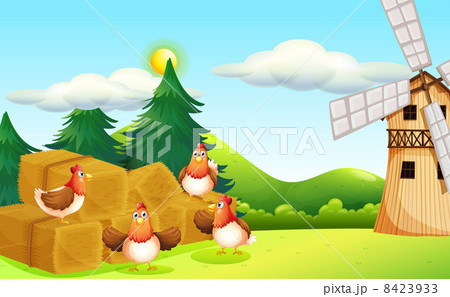 Four chickens at the hay with a windmill 8423933
