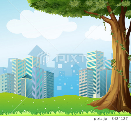 A giant tree with vine plants across the high buildings A giant tree with vine plants across the high buildings 8424127