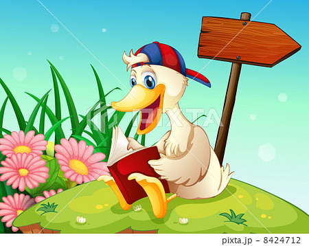 A duck at the top of the hill reading near the arrow signboard A duck at the top of the hill reading near the arrow signboard 8424712