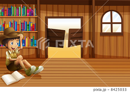 A young boy reading inside the room with a swingdoor 8425033