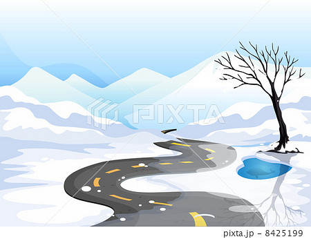 A long road at the snowy place going to the mountains 8425199