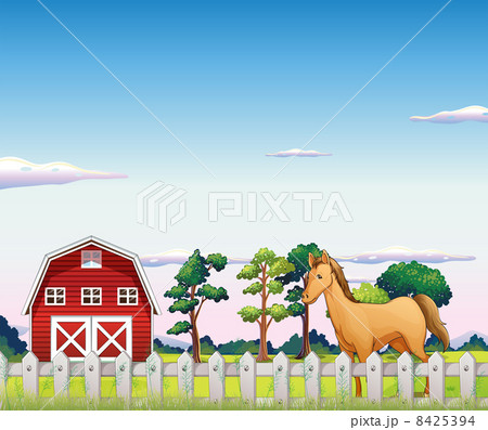 A horse inside the fence with a barn 8425394