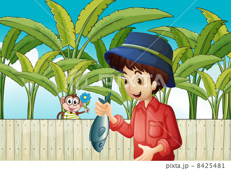 A fisherman holding a fish A fisherman holding a fish 8425481