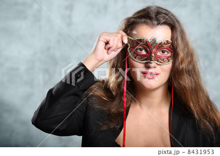 Portrait of beautiful long, brown hair young girl in mask in photo studio, half body Portrait of beautiful long, brown hair young girl in mask in photo studio, half body 8431953