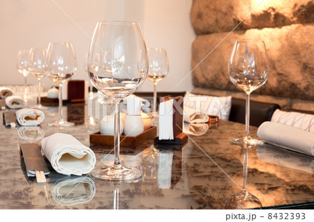 Glasses on table in sushi restaurant, focus on glass Glasses on table in sushi restaurant, focus on glass 8432393