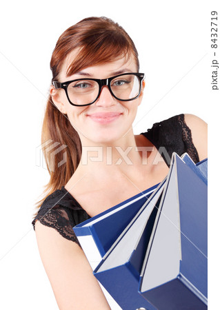 Happy girl in big glasses holds three large blue folders isolate 8432719