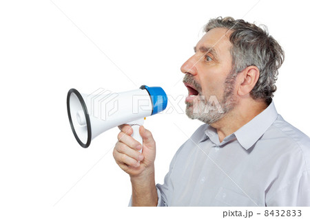 An elderly man says something into a megaphone 8432833