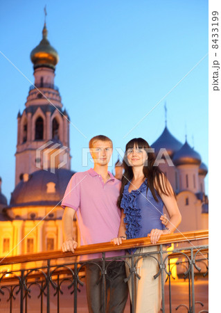 husband wife hug near Alexander Nevsky church in Vologda, Russia, long exposure 8433199