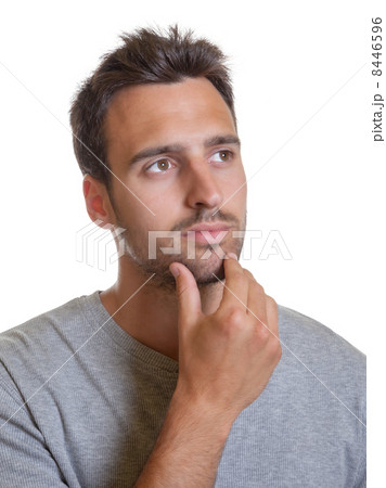 Latin man touching his head Latin man touching his head 8446596