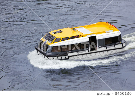 Lifeboat floats on sea Lifeboat floats on sea 8450130