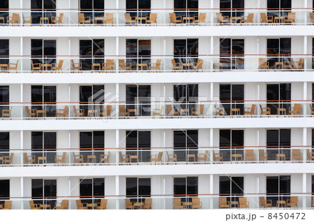 many rows of windows and balconies on board of cruise liner. cha 8450472