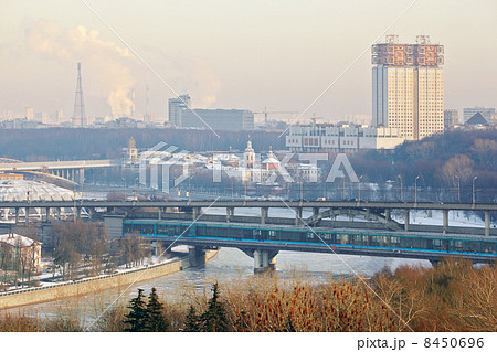 Luzhnetsky metro bridge in winter - two-story arched bridge acro Luzhnetsky metro bridge in winter - two-story arched bridge acro 8450696