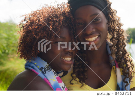 Portrait of 2 black sisters 8452711