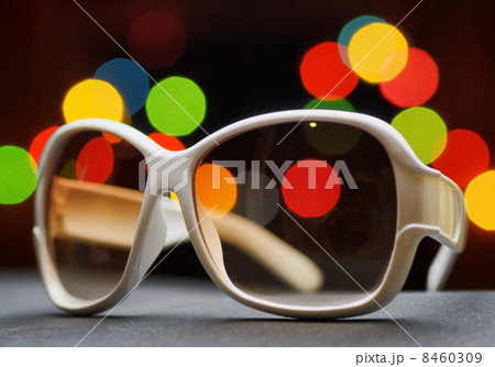 White plastic sunglasses. Funny bokeh White plastic sunglasses. Funny bokeh 8460309