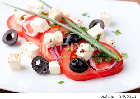 Tomato salad with feta and olives 8460513