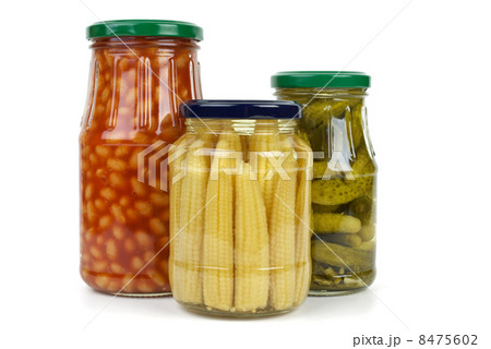Glas jars with cornichons, haricot beans and corn ears 8475602