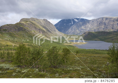 Mountain Knutshoe and lake Nedre Leirungen (Jotunheimen, Norway) 8476285