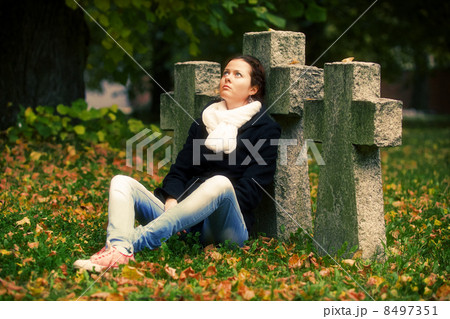 sad girl sitting 8497351