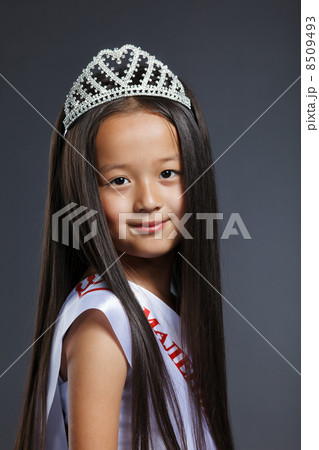 Portrait of cute little girl in precious tiara 8509493