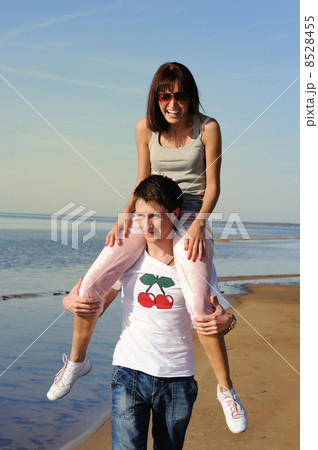 Young couple in love on the beach Young couple in love on the beach 8528455